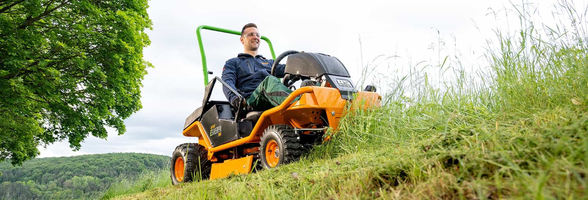 AS-motor AS 920 E-Sherpa 2WD mwoing through steep slopes and high gras